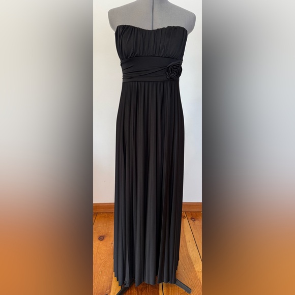 Black strapless sweetheart neckline maxi dress with flower detail.  Medium. - Picture 1 of 4